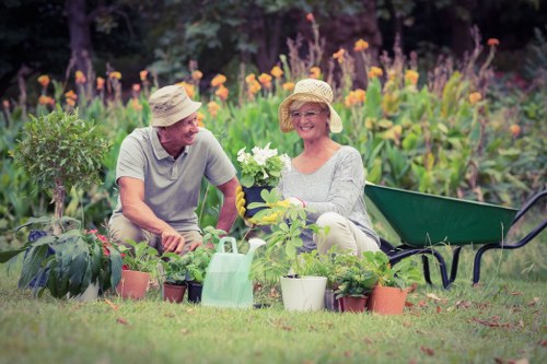 Expert gardeners trimming hedges in Brimsdown